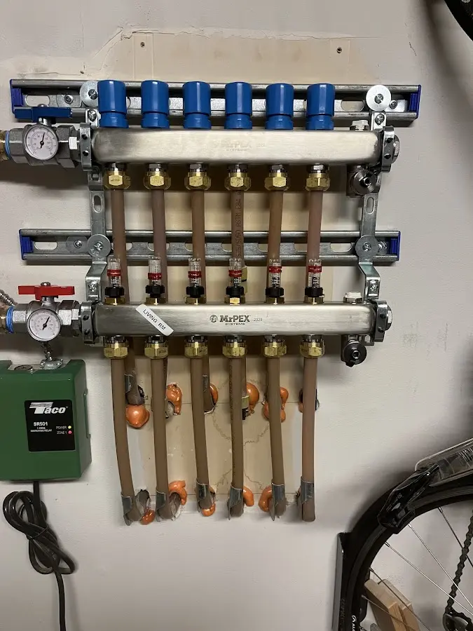 Plumber performing Leak Detection at a residential property in Fishers